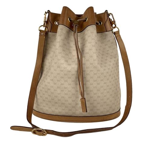 gucci drawstring bag white|Gucci small bucket bag.